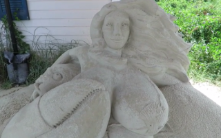 Image of sand mermaid via Cape Cod Times