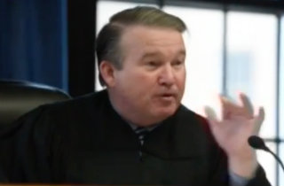 Judge John McMain (MLive YouTube Channel)