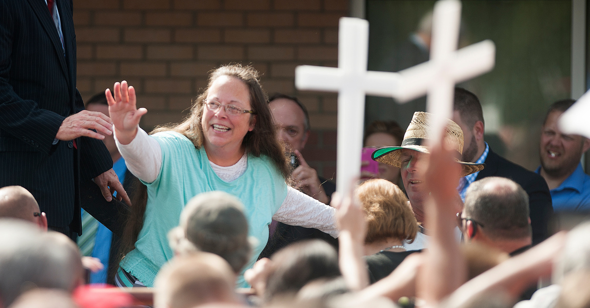 Kim Davis poses with white crosses