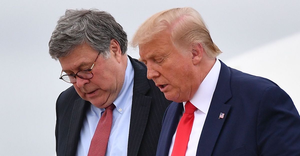 US President Donald Trump (R) and US Attorney General William Barr step off Air Force One upon arrival at Andrews Air Force Base in Maryland on September 1, 2020. - US President Donald Trump said September 1, 2020 on a visit to protest-hit Kenosha, Wisconsin that recent anti-police demonstrations in the city were acts of "domestic terror" committed by violent mobs. (Photo by MANDEL NGAN / AFP)