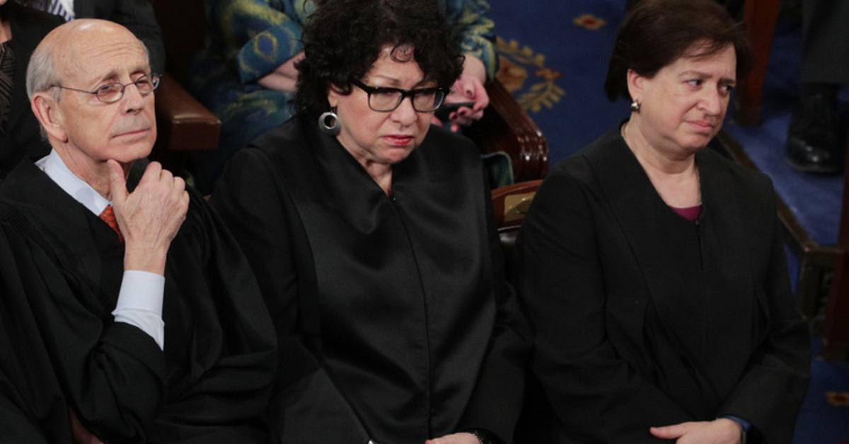 Justices Stephen Breyer, Sonia Sotomayor, and Elena Kagan listen to then-President Donald Trump's address before a joint session of Congress in a February 28, 2017 file photo.