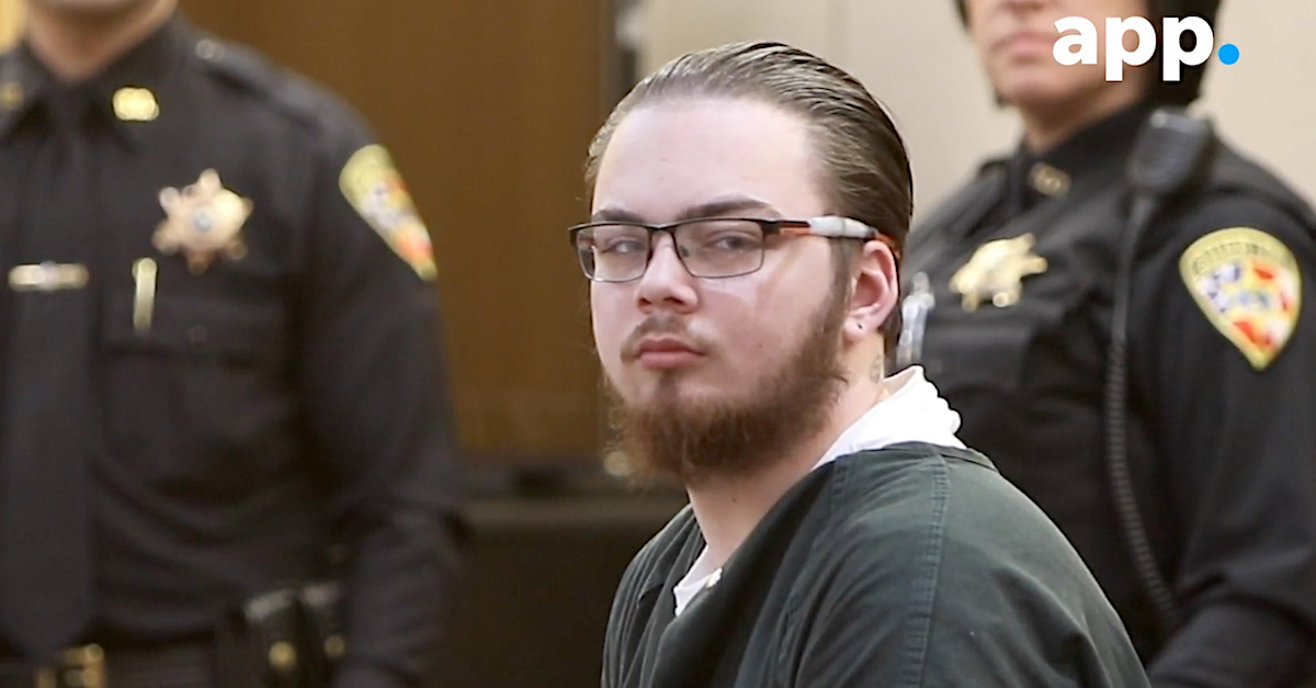Austin Meli sits in court in an image taken from a video screengrab.