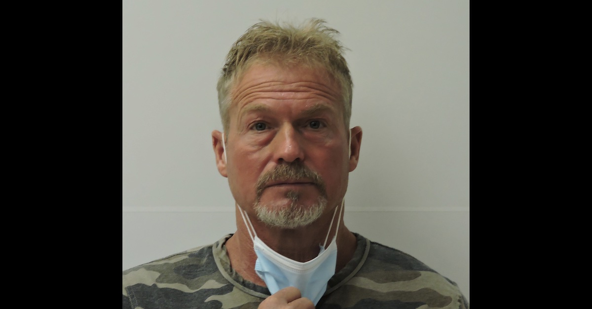 Barry Morphew appears in a mugshot