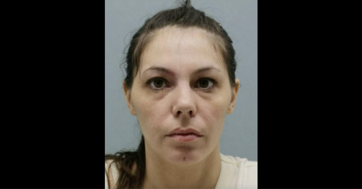 Christine Fesus appears in a mugshot