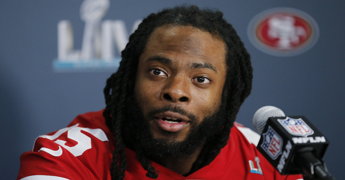 Richard Sherman speaks to the press