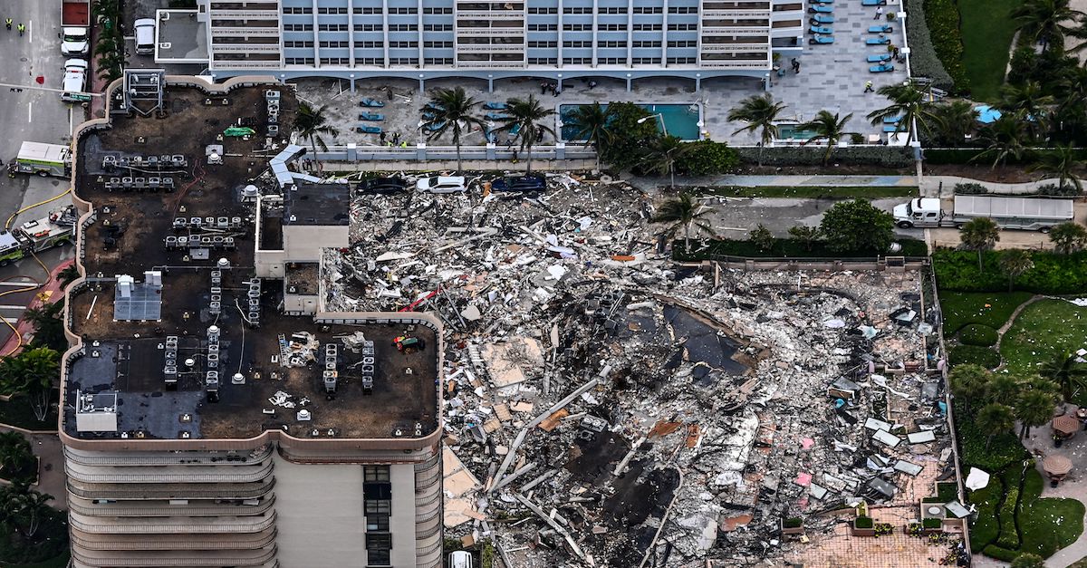 An aerial view of a collapsed condo in South Florida