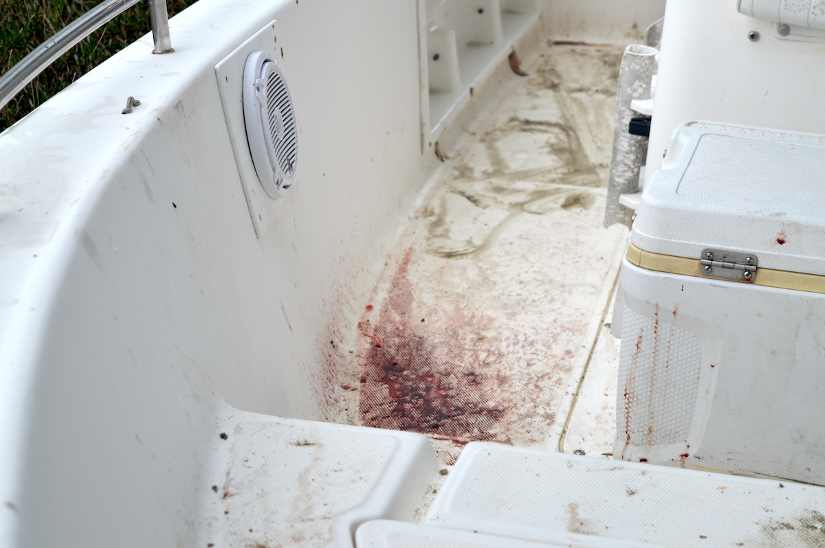 This image taken by a South Carolina coroner shows what appear to be blood stains inside a boat owned by Alex Murdaugh and allegedly operated by Paul Murdaugh after it crashed into a bridge pier on Feb. 23, 2019. (Image obtained from the South Carolina Attorney General's Office pursuant to a Freedom of Information Act request by Law&Crime.)