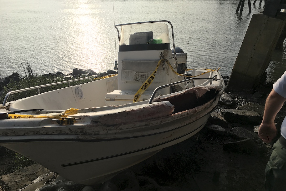 A boat owned by Alex Murdaugh and allegedly operated by Paul Murdaugh was covered in police tape after it crashed into a bridge pier on Feb. 23, 2019. (Image obtained from the South Carolina Attorney General's Office pursuant to a Freedom of Information Act request by Law&Crime.)