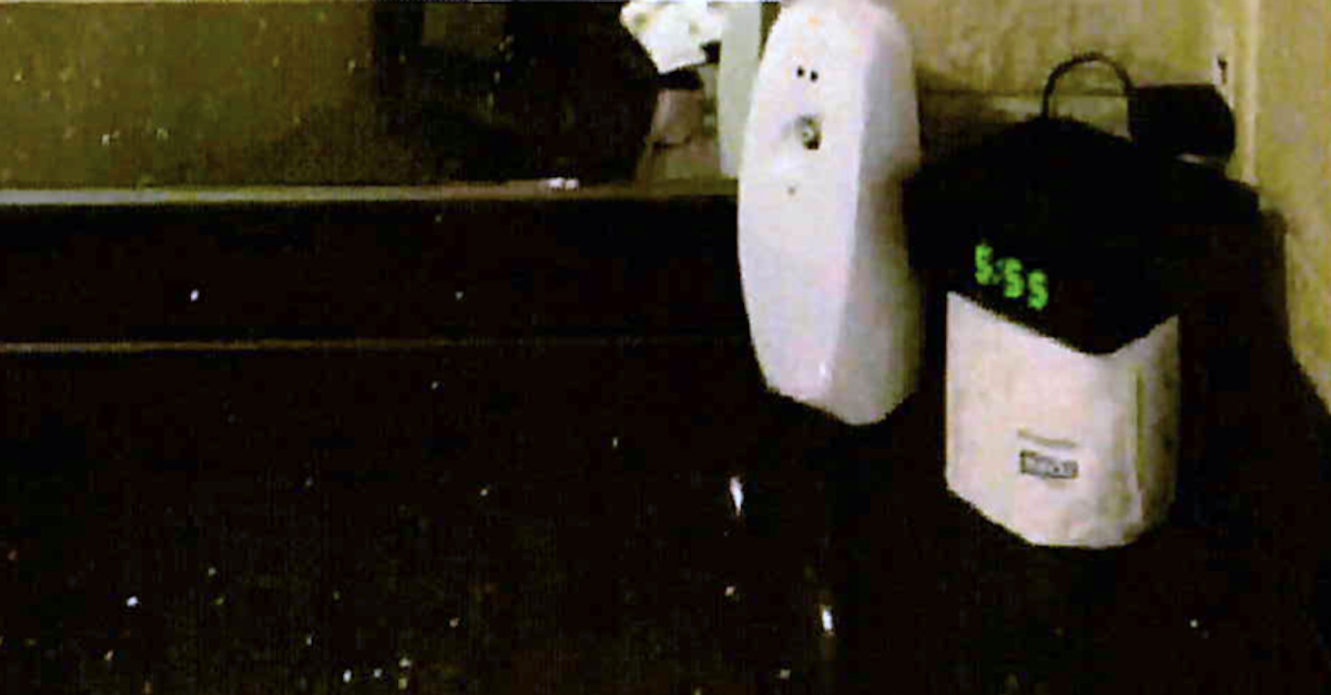 Prosecutors said these devices on a hotel bathroom countertop were the defendant's hidden cameras. (Image via federal court documents.)