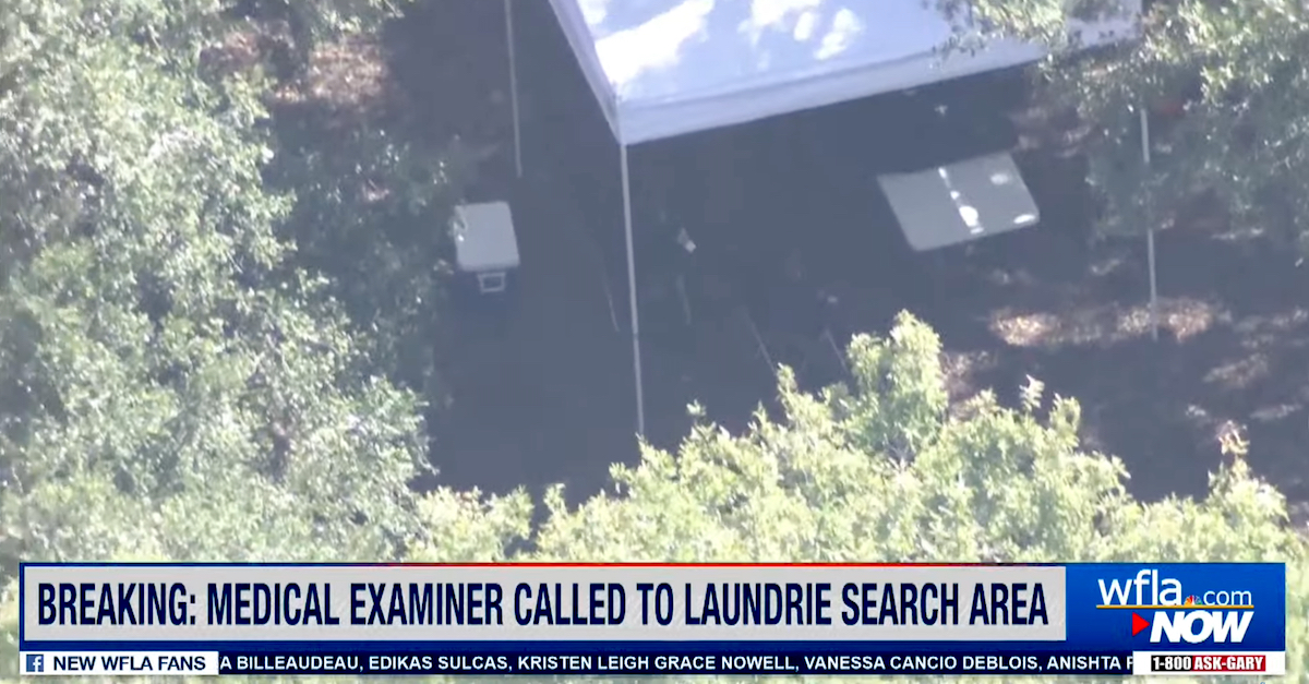 One of several law enforcement tents was erected near the entrance to the Myakkahatchee Creek Environmental Park on Wed., Oct. 20.  (Image via screengrab from WFLA-TV/YouTube.)