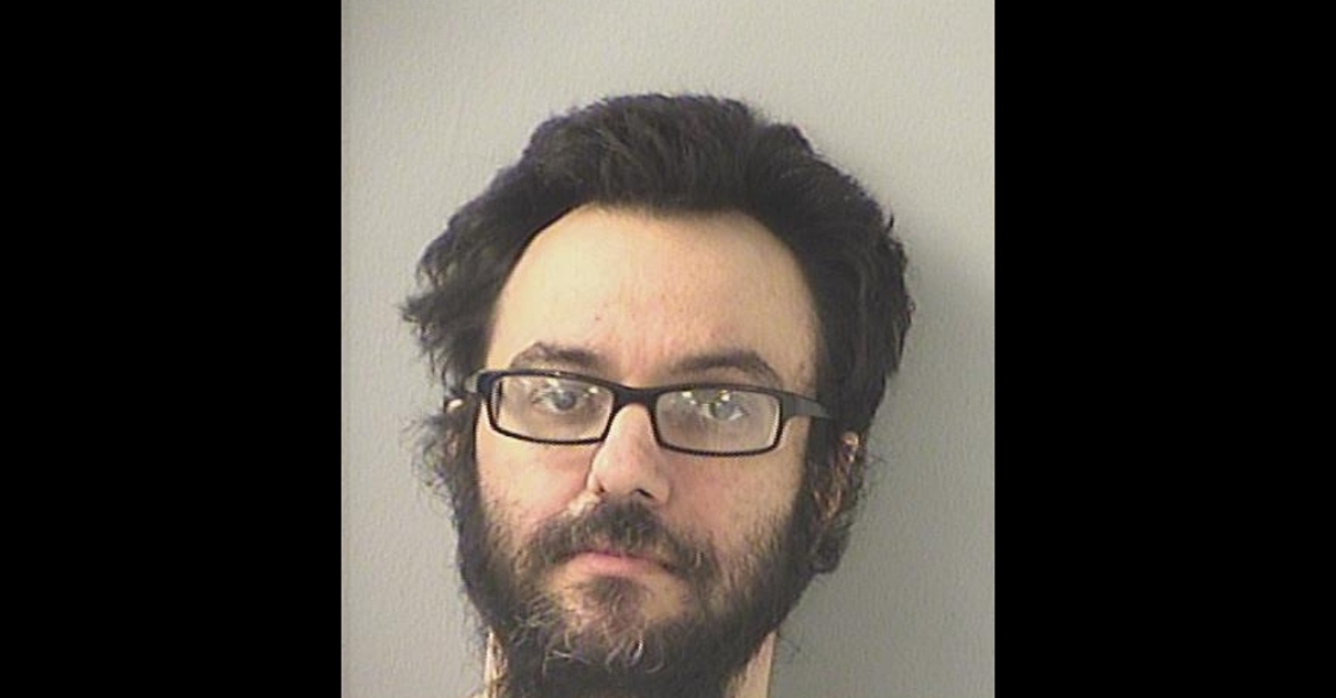 Booking photo via Charles Lee Frazier.
