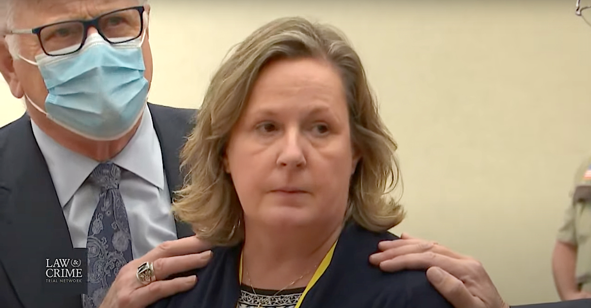 Kim Potter's attorneys comforted their client seconds before Judge Regina M. Chu read two guilty verdicts. (Image via screengrab from the Law&Crime Network.)