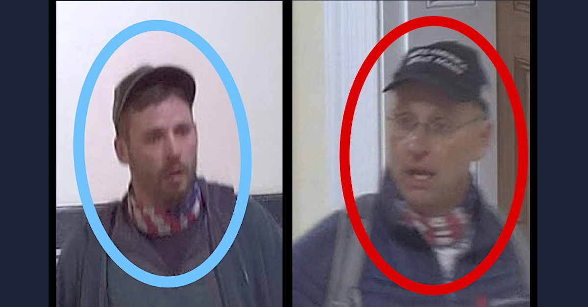 Daniel Johnson (left) and his father Daryl Johnson (right) appear in a video screengrab recorded in a U.S. Capitol hallway. (Image via federal court documents.)