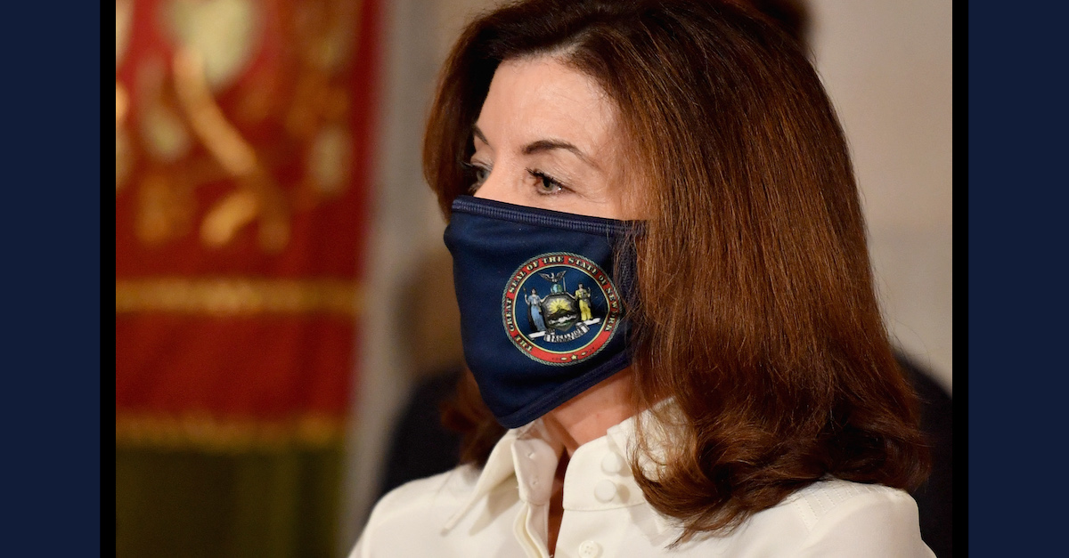 Gov. Kathy Hochul is seen wearing a face mask during her swearing-in ceremony on Aug. 24, 2021. (Photo by Angela Weiss/AFP via Getty Images.)