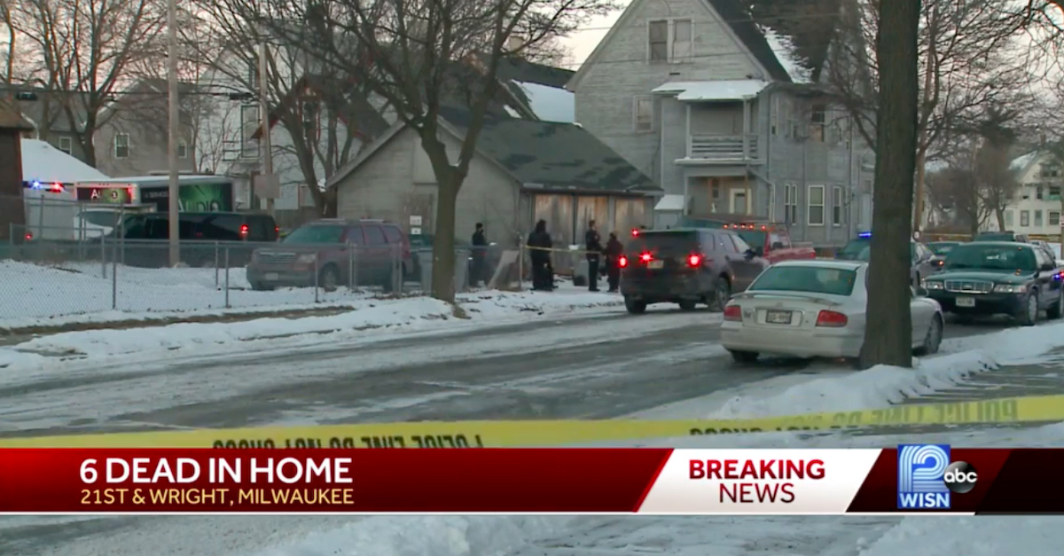 The scene outside of the Milwaukee home where six dead bodies were discovered.