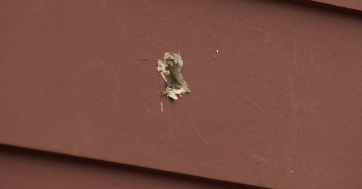 Bullet hole in Cliff Long's cottage after Nicholas Twining shot and killed Caitlin Rogers.