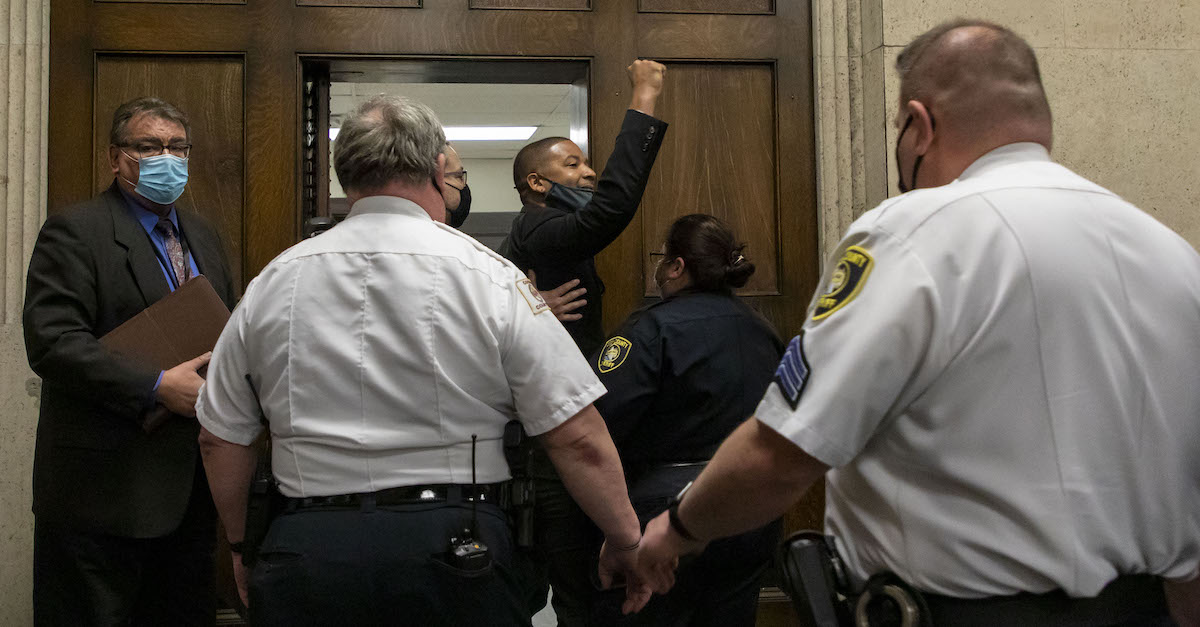 Actor Jussie Smollett appeared to yell back into the courtroom while being led to jail on Thursday, March 10, 2022. (Image via Brian Cassella/Pool/Chicago Tribune.)