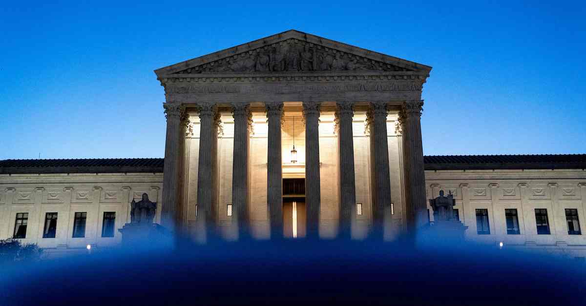 Supreme Court building at night