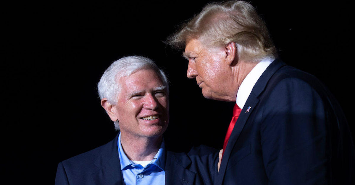 Mo Brooks and Donald Trump in one "Save America" demonstration at York Family Farm on August 21, 2021 in Cullman, Alabama.
