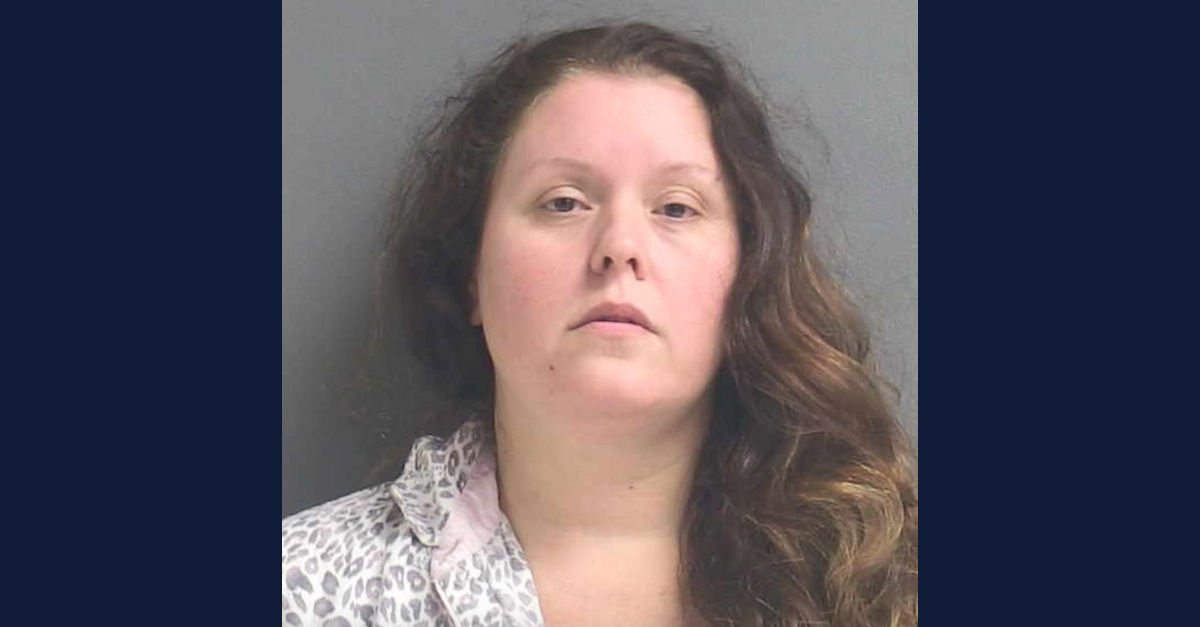 Jennifer Adams-Lafland appears in a mugshot