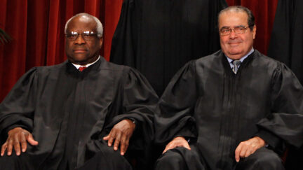 Justices Clarence Thomas and Antonin Scalia were seated together on Oct. 8, 2010, during the Supreme Court's formal portrait.