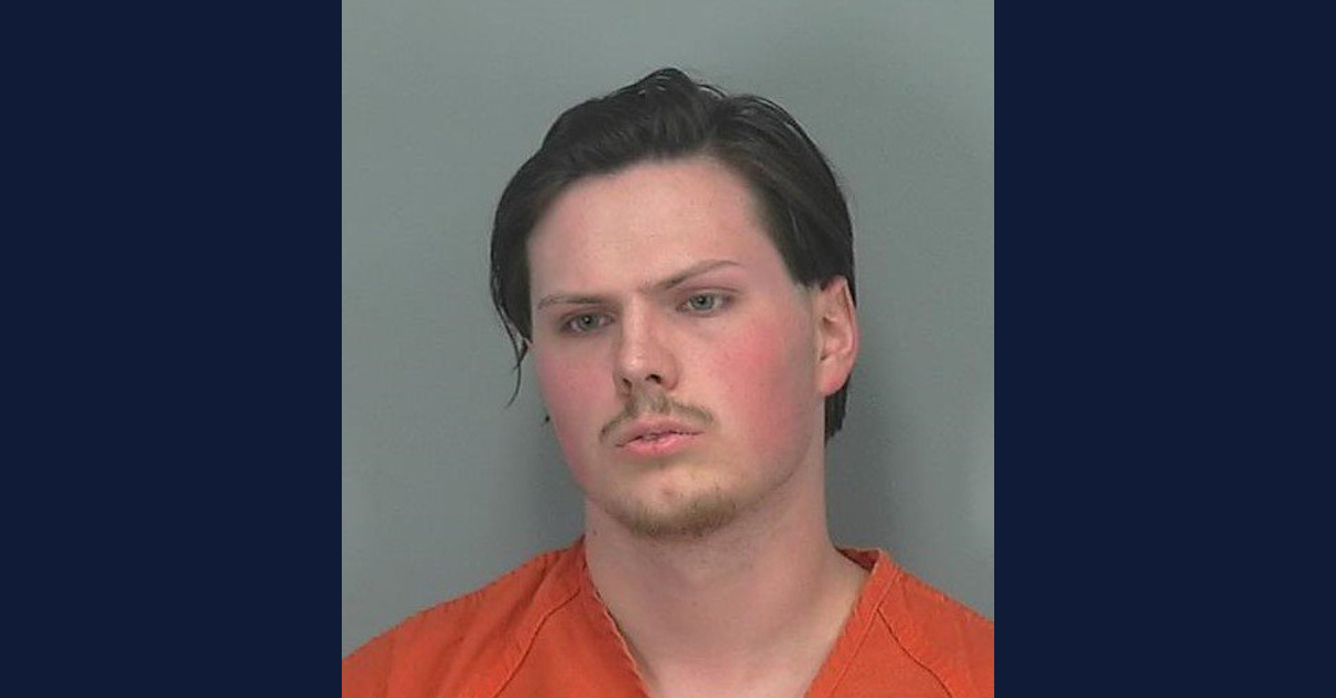 Joshua Adam Bowen appears in a mugshot