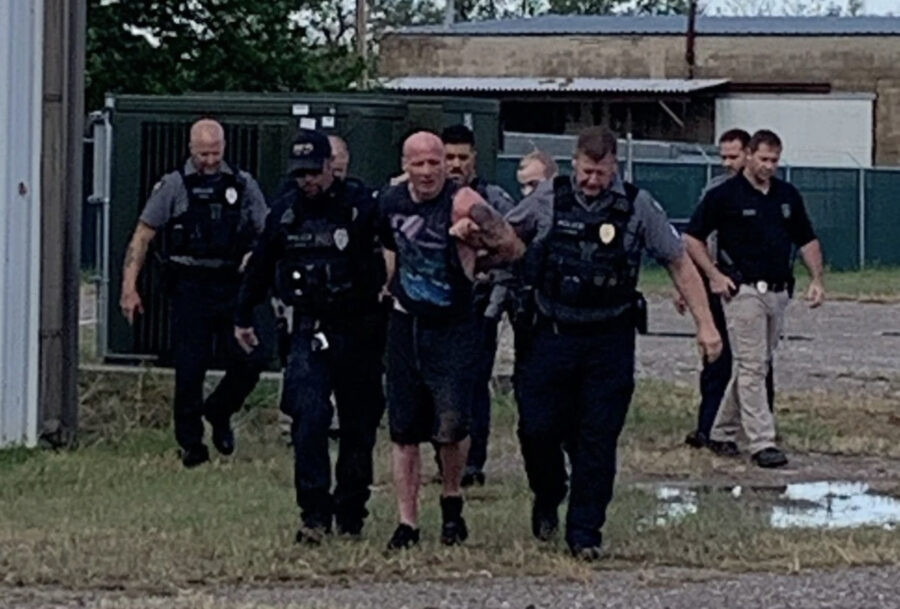 Michael S. Geiger being arrested