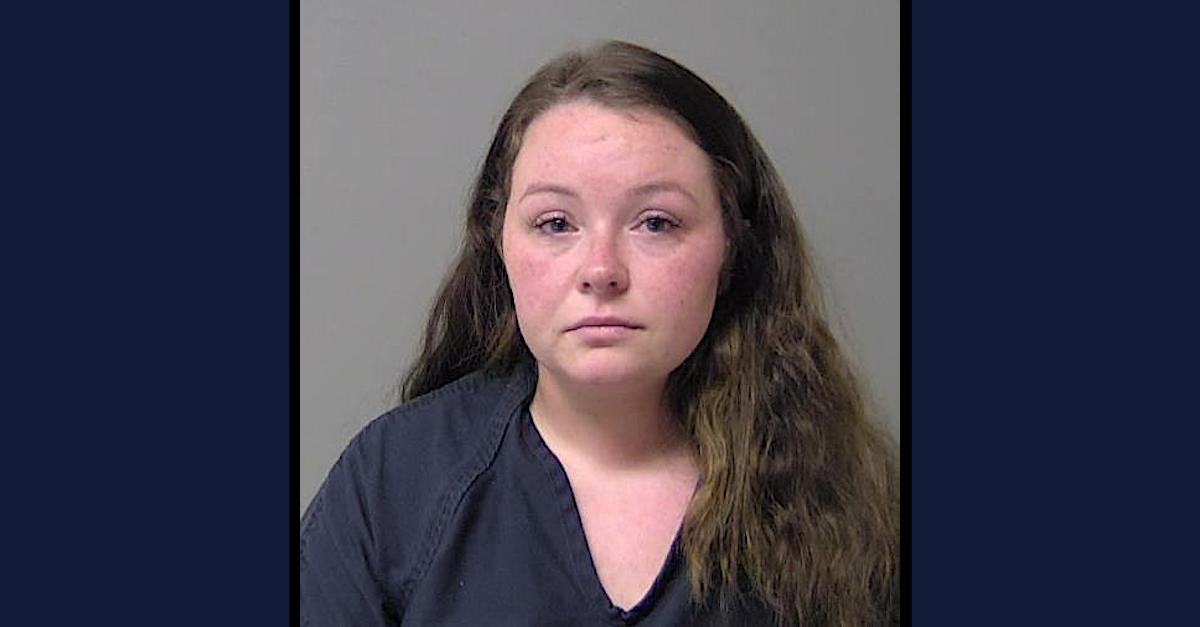 Taylor D. Burris is shown in a Macon County Jail mugshot.