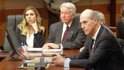 Tex McIver (center) listened as his jury was polled in 2018. His attorneys Amanda Clark Palmer and Bruce Harvey flanked him; co-counsel Don Samuel was barely visible between Harvey and McIver. (Image via WAGA-TV/YouTube screengrab.)