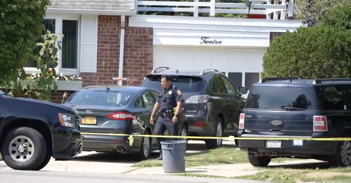 Police in front of the home where Marina Gabunia Verriest was mauled to death by her late step-son's pit bull (via NY Post screenshot).