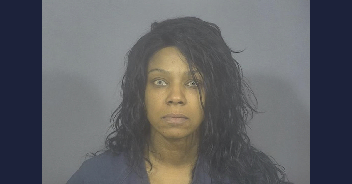 Deidra Tomlin appears in a mugshot