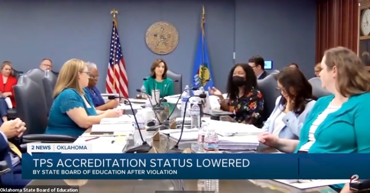 Members of the Oklahoma State Board of Education are seen in a July 28, 2022 meeting about whether to downgrade the accreditation of two public schools in the state over allegations it violated the state's anti-CRT law.