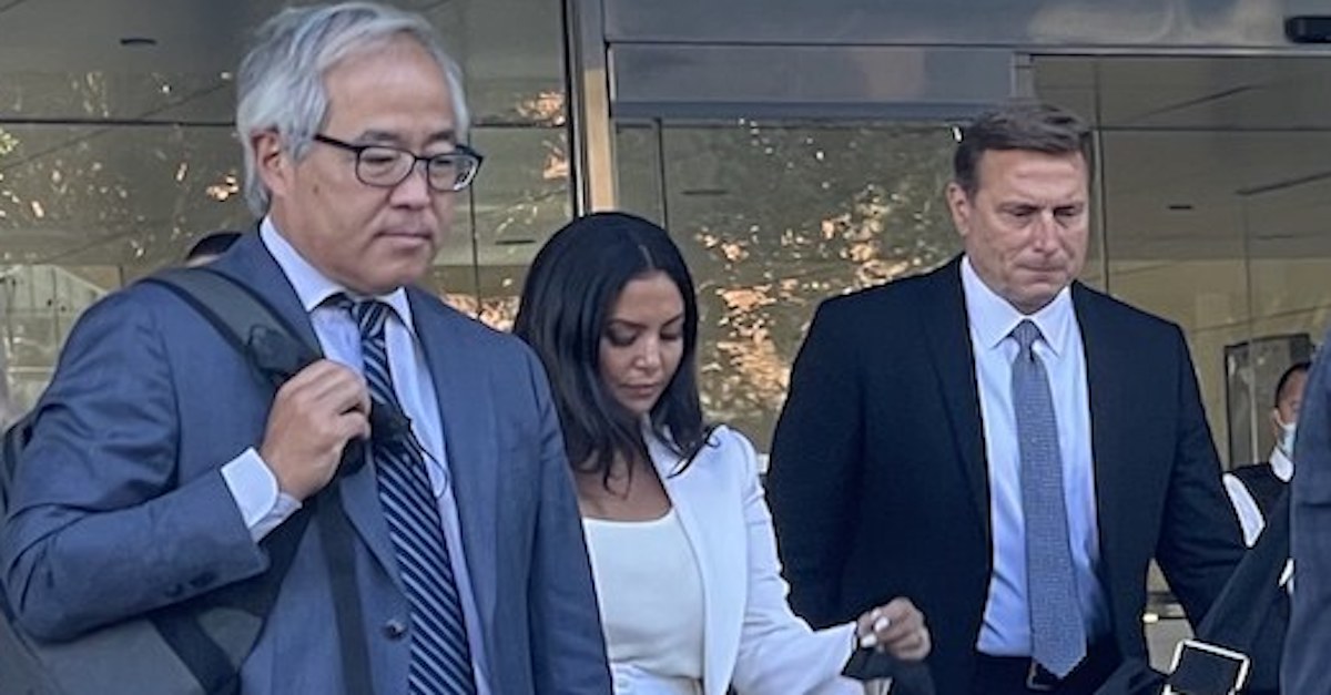 Vanessa Bryant, center, leaves the Los Angeles federal courthouse on Friday, Aug. 12, 2022, with her security guard (right) and her lawyer Luis Li (left) (photo by Meghann Cuniff for Law&Crime).