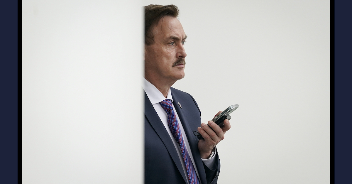 A photo shows Mike Lindell with his mobile phone.