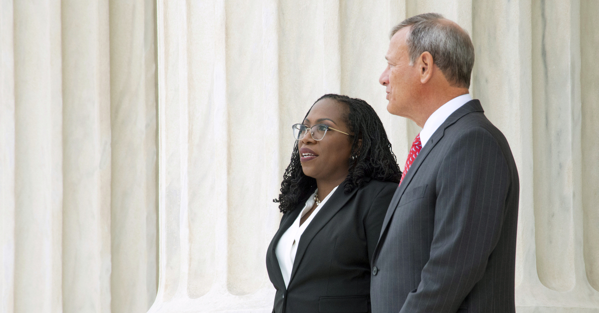 Justices Ketanji Brown Jackson (L) and John Roberts (R)
