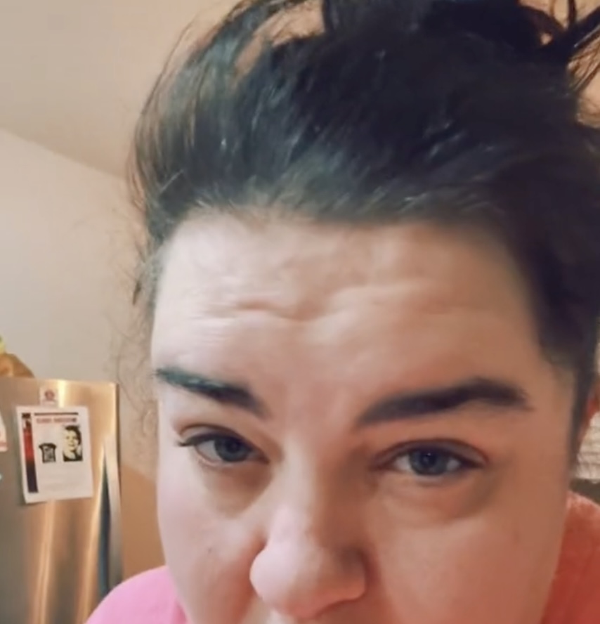 Sarah Anne Wondra's TikTok video with Michael's missing poster in the background