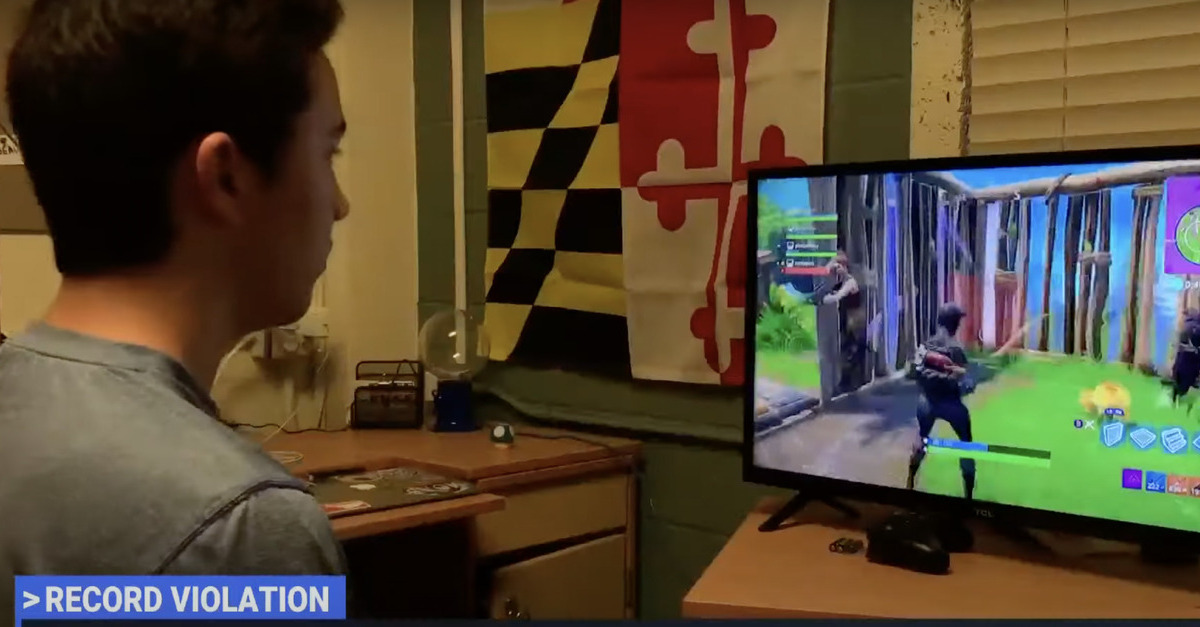 A child is shown playing Fortnite.