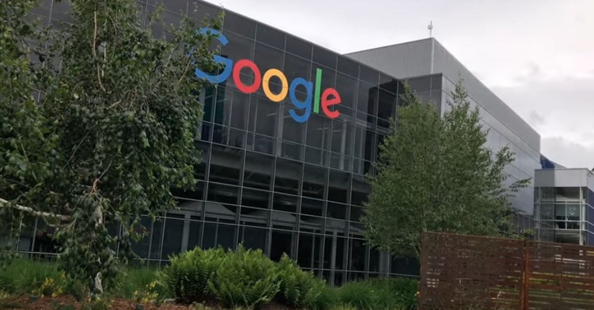 The word "Google" appears in different letters on a black-windowed building at the tech company's campus in Mountain View, Calif.