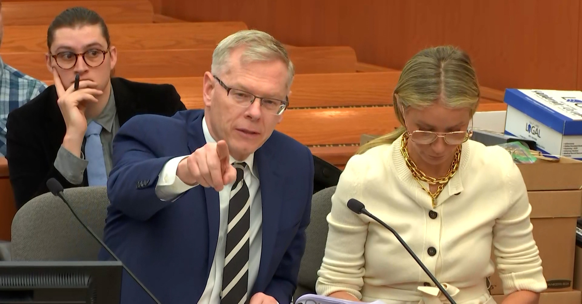 Gwyneth Paltrow (R) and her attorney Stephen Owens (L) in court