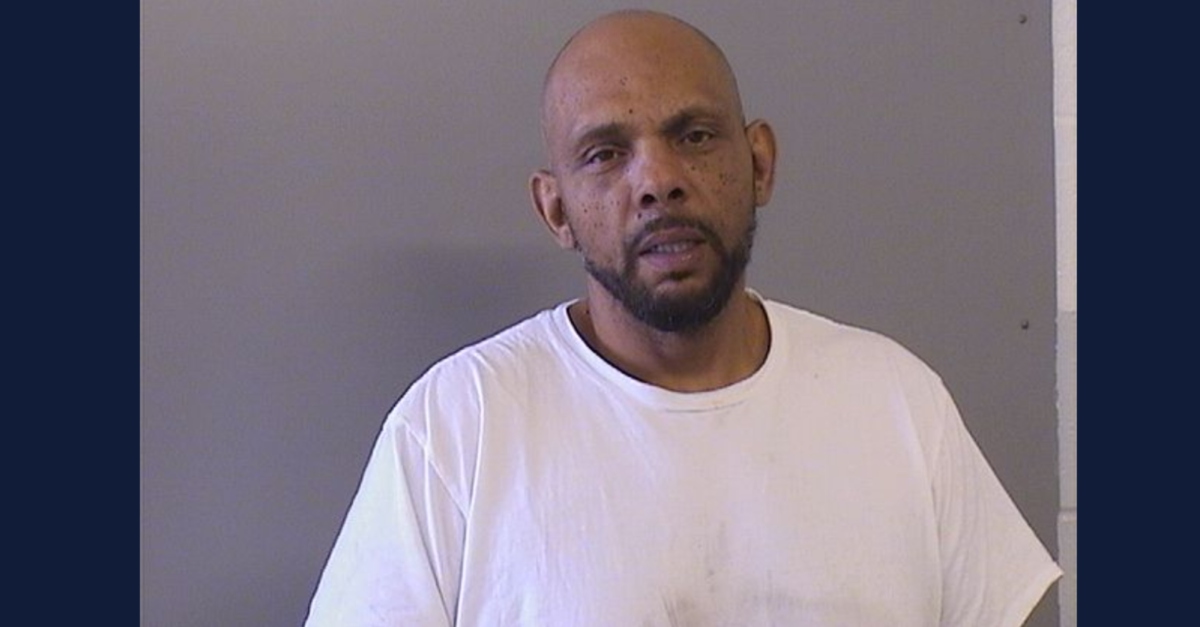 Richard Lee Wallace Jr. tossed a woman off a fourth-floor balcony, police said. (Mugshot: Tulsa County Jail)