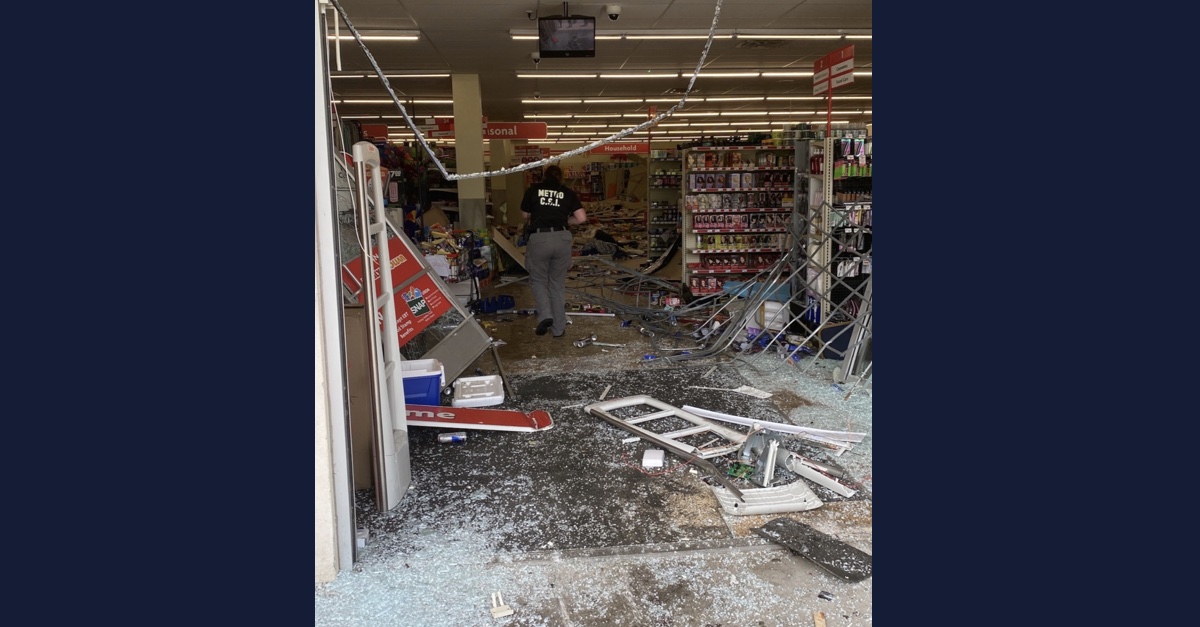 Investigators assess the damage at a Family Dollar in Nashville