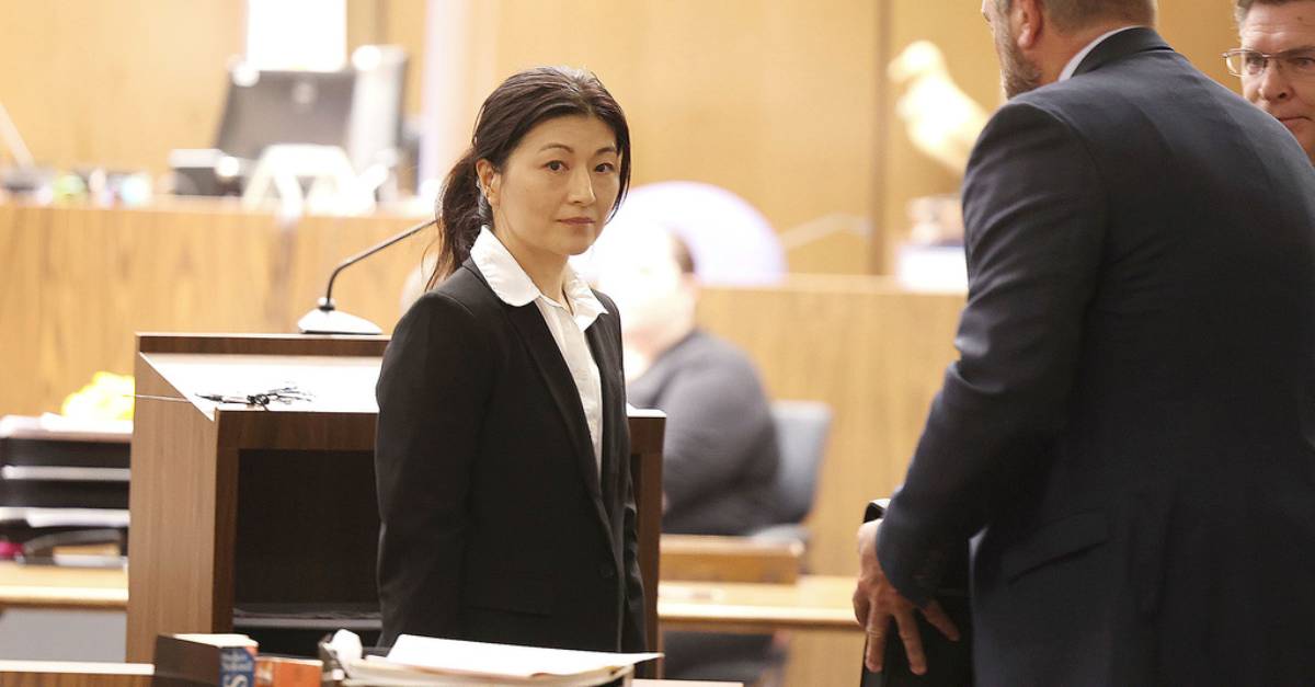 Yue “Emily” Yu and her attorneys appear before Judge Jonathan Fish for her arraignment in Orange County Superior Court in Santa Ana, Calif., Tuesday, April 18, 2023. Yu, a Southern California dermatologist, has been charged with poisoning her husband by pouring liquid drain cleaner into his tea. (Frederick M. Brown/Daily Mail.com via AP, Pool)