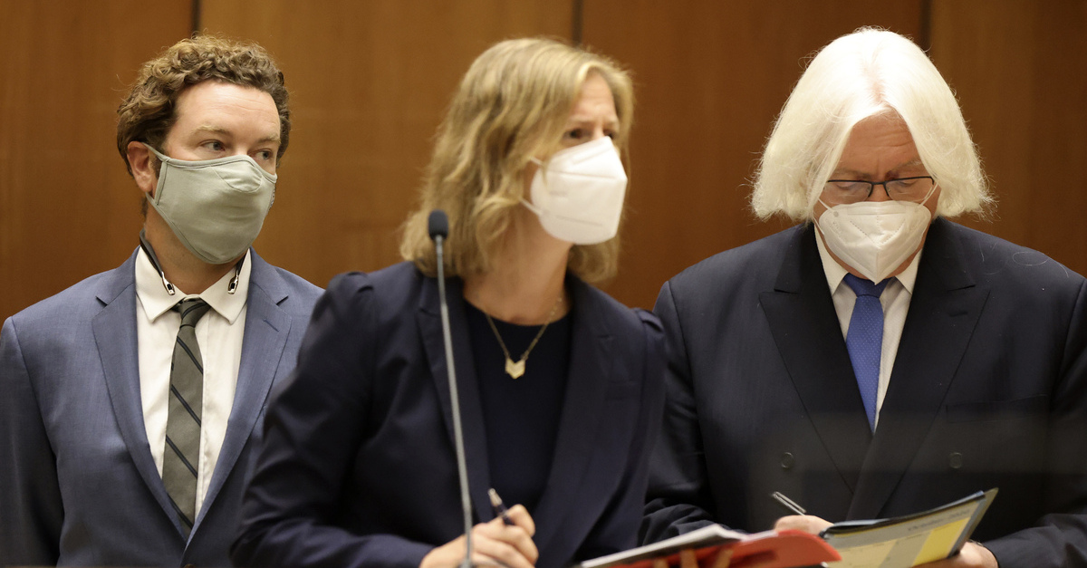 Actor Danny Masterson, left, stands with his lawyers Thomas Mesereau, right, and Sharon Appelbaum, center.