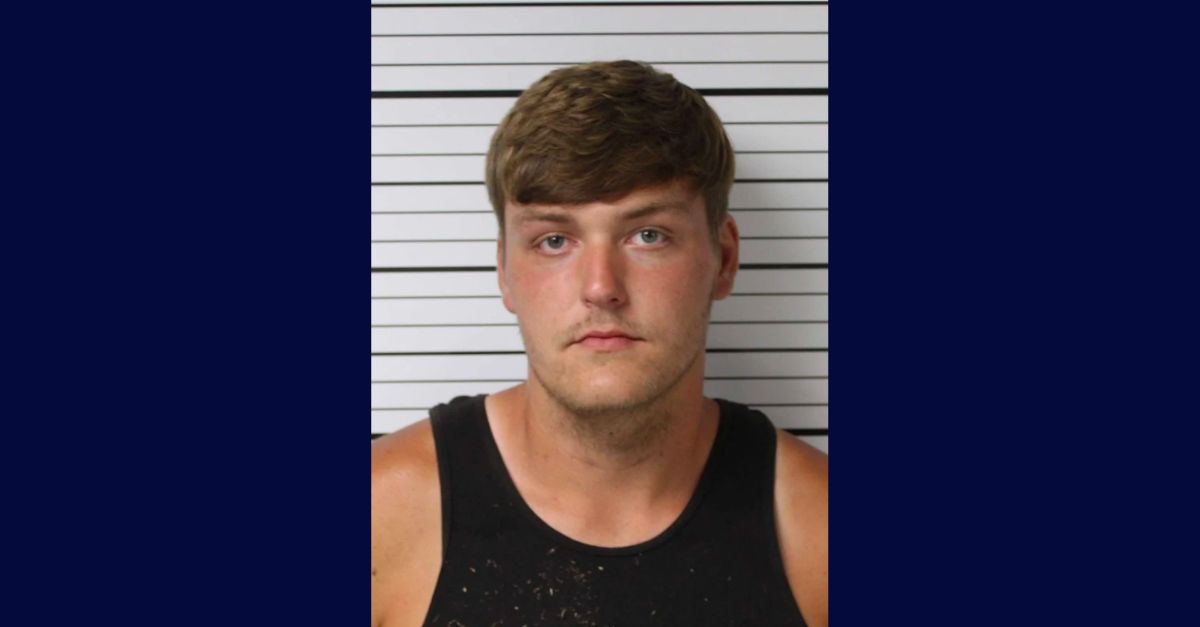 Dustin Mason appears in a mugshot