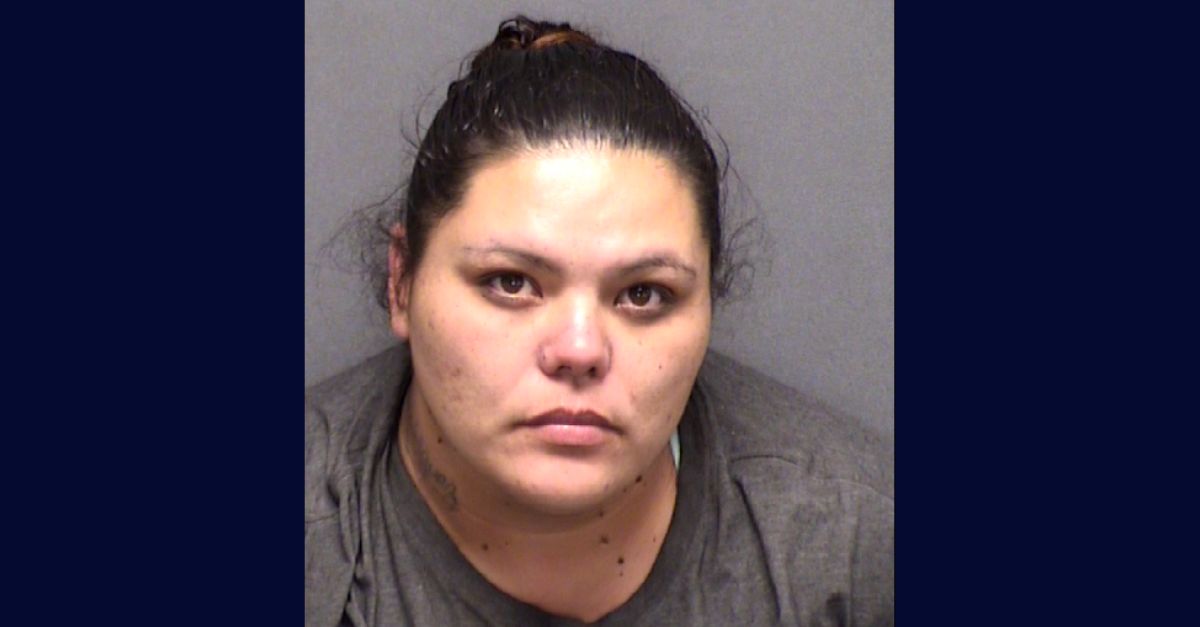 Christina Rodriguez appears in a booking photo