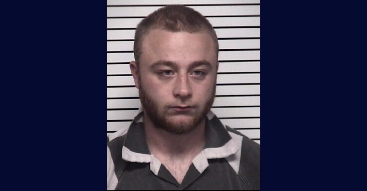 Joshua James Pinquet appears in a booking photo