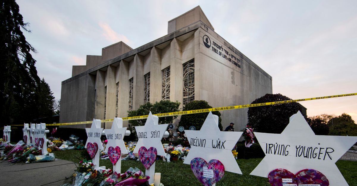 FILE - A makeshift memorial stands outside the Tree of Life Synagogue in the aftermath of a deadly shooting in Pittsburgh, Oct. 29, 2018. Hardy Carroll Lloyd, a self-proclaimed white supremacist, pleaded guilty on Tuesday, Sept. 19, 2023, to making online threats toward the jury and witnesses at the trial of a man who killed 11 congregants at the Pittsburgh synagogue. (AP Photo/Matt Rourke, File)