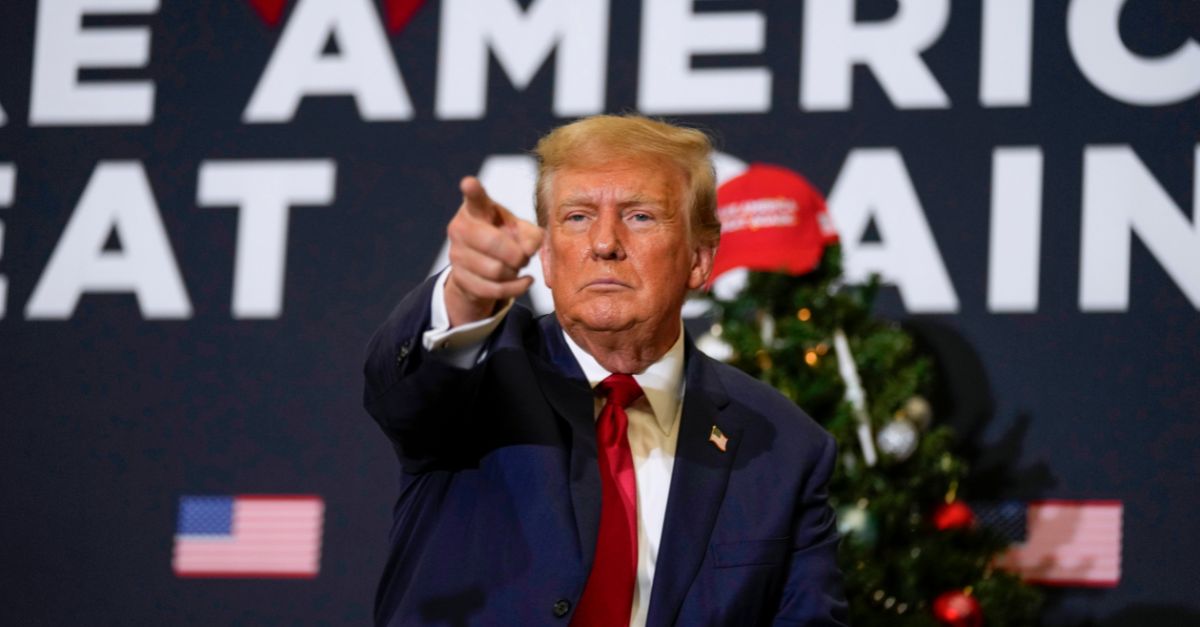 Former President Donald Trump points to supporters during rally Dec. 19, 2023, in Waterloo, Iowa. (AP Photo/Charlie Neibergall, File)