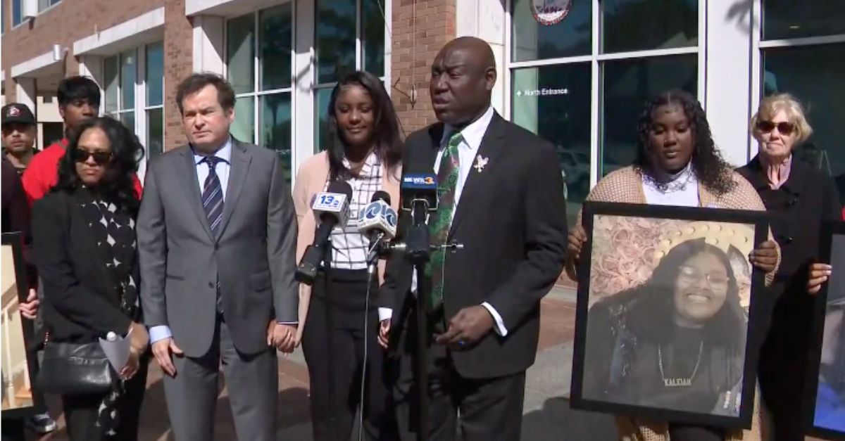 Ben Crump, center, speaks at a press conference announcing a lawsuit over the death of 16-year-old Kaleiah Jones. Kaleiah's mother, Keyonna Stewart, stands to Crump's right (WAVY).