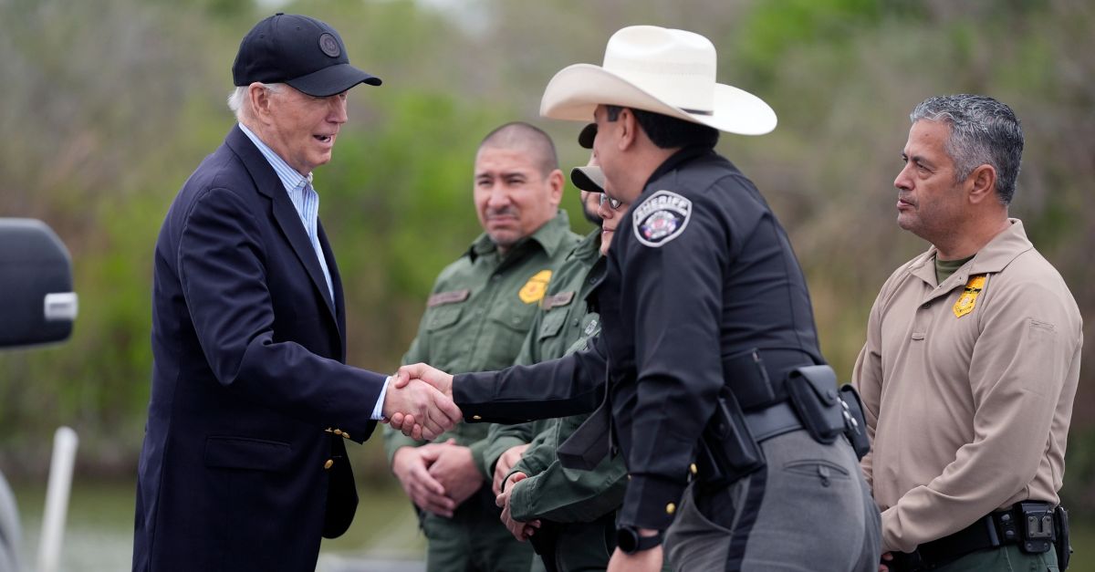 FILE - President Joe Biden talks with the U.S. Border Patrol and local officials, as he looks over the southern border, Feb. 29, 2024, in Brownsville, Texas, along the Rio Grande. (AP Photo/Evan Vucci, File) 